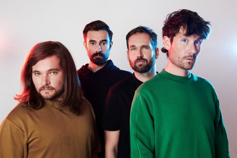 Bastille’s Dan Smith On Technological Mania & The "Totally Bizarre" Timing Of Their New Album, 'Give Me The Future'